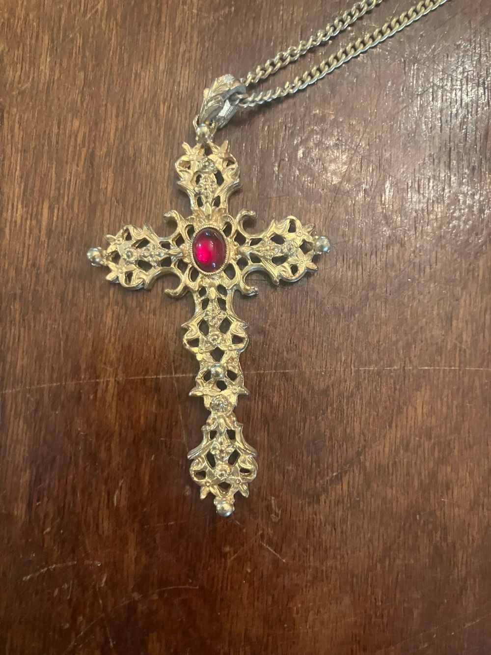Avon Gold-Tone Filigree Cross Necklace with Red Cabochon